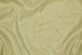 Background of draped light green fabric with silver lurex thread