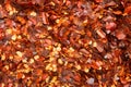 Background of dried chilly pepper flakes