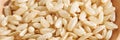 A background of dry brown rice grains showcases the integral, uncooked texture Royalty Free Stock Photo