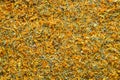 Background of dry calendula flowers, dried marigold petals. Royalty Free Stock Photo