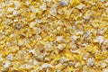 Background of dry flaked corn. Royalty Free Stock Photo