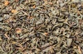 Background of dry green tea with flavors Royalty Free Stock Photo