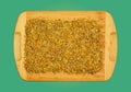 Background of dry herb CALENDULAE FLORES or Marigold petals used in herbal medicine. The concept of herbal treatment. Active