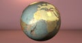 A background with the Earth planet made in rusty material, which shows the Africa continent. Royalty Free Stock Photo