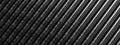 A background of an Elegant and Modern 3D Rendering image of a dark grey carbon fiber cable with a uniform diagonal