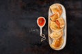 Background empanadillas, typical spanish small tuna or meat fried pies, tomato sauce, bell pepper Royalty Free Stock Photo