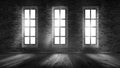 A brick wall in an empty room, large wooden windows, a magical light and the rays of the sun. Royalty Free Stock Photo
