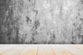 Background with empty wooden deck table over grunge cement wall, vintage, background, template Royalty Free Stock Photo