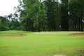 Background of evening golf course has sunlight shining down at golf course in Thailand. Nice scenery on a golf course at a late Royalty Free Stock Photo