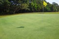 Background of evening golf course has sunlight shining down at golf course in Thailand. Nice scenery on a golf course at a late Royalty Free Stock Photo