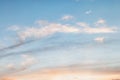 Background of evening sky, light stretched clouds in the sun. Sky with a gradient of color from warm to cold Royalty Free Stock Photo