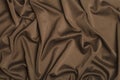 Background fabric. Brown textile fabric with texture and pattern drapery background