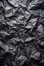 Black paper with folds as a background Royalty Free Stock Photo