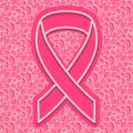 Background fight against breast cancer. Planimetric tape with the crossed ends on patterned background.