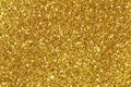 Background filled with shiny gold glitter.