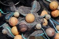 Background of Fishing Net Pile with Yellow Floats Royalty Free Stock Photo