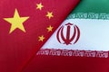 Background of the flags of iran and China. The concept of interaction or counteraction between the two countries