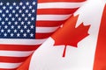 Background of the flags of the USA and canada. The concept of interaction or counteraction between two countries. International