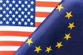 Background of the flags of the USA and European Union. The concept of interaction or counteraction between two countries. Royalty Free Stock Photo