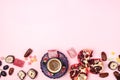 Background FlatLay with Turkish Delight Turkish Coffee Date Fruit and Garnet on Pink Background Top View Copy Space Ramadan Royalty Free Stock Photo