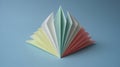 Background of folded paper fan in pastel colors for creative design Royalty Free Stock Photo