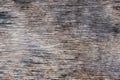 Background in the form of a wooden surface with horizontal structural cracks and with brown spots Royalty Free Stock Photo