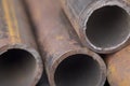 Background of fragments of rusted metal pipes