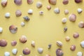 Background with frame of seashells on yellow. Top view with copy Royalty Free Stock Photo