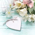 Background with fresh flowers, heart and candles Royalty Free Stock Photo