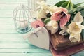 Background with fresh flowers, old books and candles Royalty Free Stock Photo