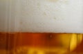 Background frothy beer in a glass mug Royalty Free Stock Photo