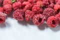 Background of frozen raspberries, fresh berries covered with frost, top view. macro photo close-up Royalty Free Stock Photo