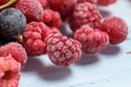 Background of frozen raspberries, fresh berries covered with frost, top view. macro photo close-up Royalty Free Stock Photo