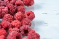 Background of frozen raspberries, fresh berries covered with frost, top view. macro photo close-up Royalty Free Stock Photo