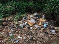 Background of garbage. Piles of undecomposed garbage. Plastic garbage fills the yard. The concept of environmental pollution Royalty Free Stock Photo