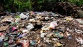 Background of garbage. Piles of undecomposed garbage. Plastic garbage fills the yard. The concept of environmental pollution Royalty Free Stock Photo