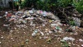 Background of garbage. Piles of undecomposed garbage. Plastic garbage fills the yard. The concept of environmental pollution Royalty Free Stock Photo