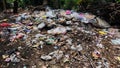 Background of garbage. Piles of undecomposed garbage. Plastic garbage fills the yard. The concept of environmental pollution Royalty Free Stock Photo