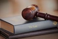 Background, gavel and law books on table of attorney, judge and justice for courtroom. Closeup of legal hammer, notebook Royalty Free Stock Photo