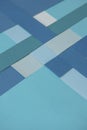 Background with geometric patterns in pastel shades of blue and