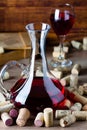 Background with glass of wine, decanter and corks Royalty Free Stock Photo