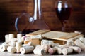 Background with glass of wine, decanter and corks Royalty Free Stock Photo