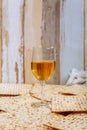 Background with glass of wine and matzo passover celebration