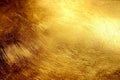 Background with gold metal wall texture refracting light Royalty Free Stock Photo