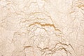 Background of gold wall with cracked texture. Royalty Free Stock Photo