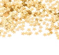 Background from golden confetti in star shape