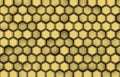 Background of golden hexagons with relief and shadows,