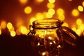 Background of golden lights in a bokeh. Defocused abstract blurred lights Royalty Free Stock Photo