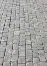 background of gray tiles called in Italian Sampietrini or pave i