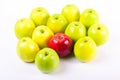 Background of green apples with one red apple. Concept Royalty Free Stock Photo